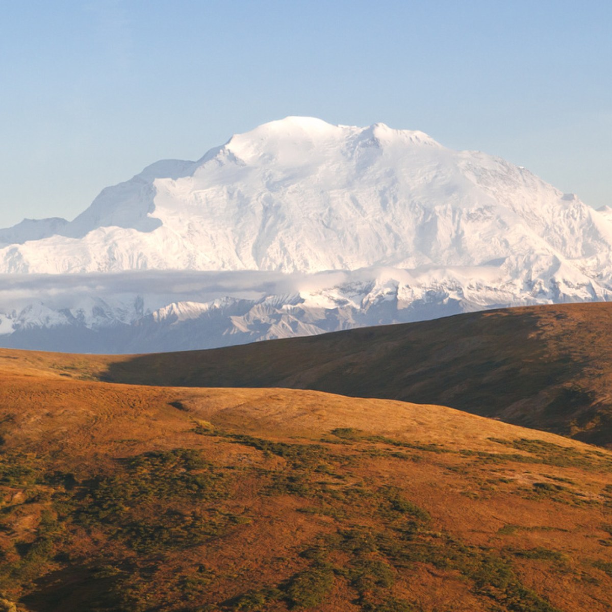 a view of a large mountain in the background