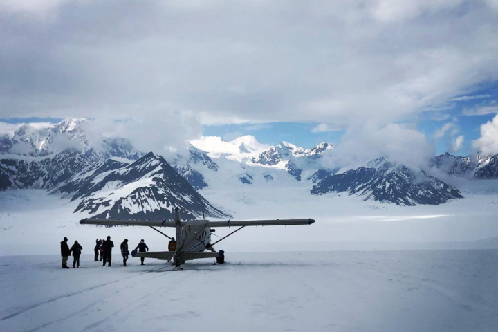 a group of people that are standing in the snow