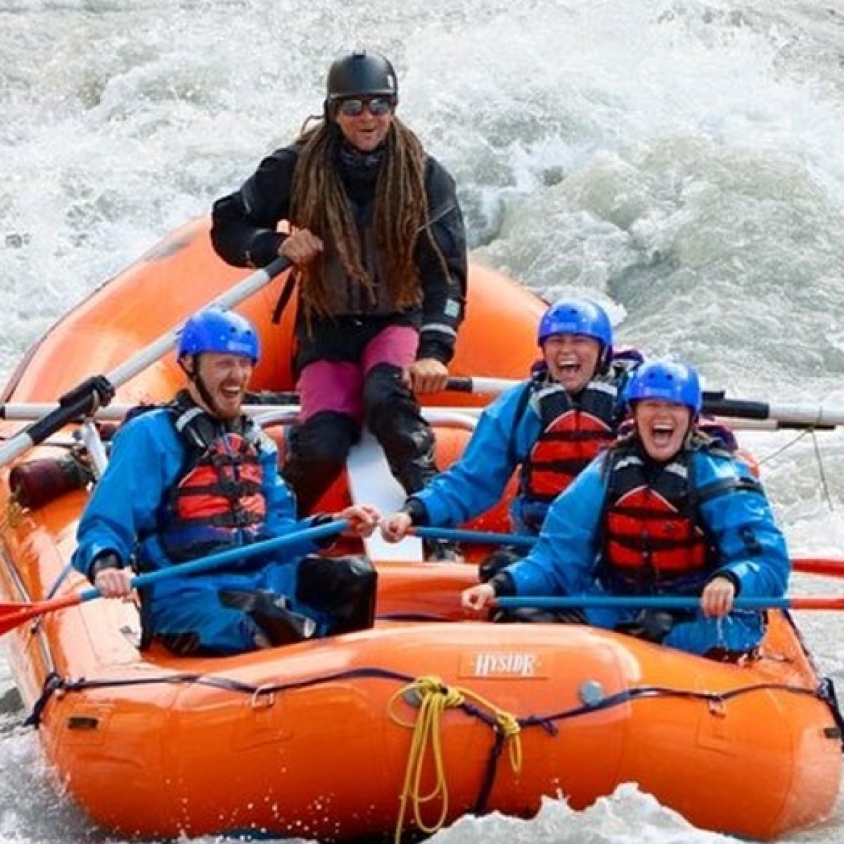 a man in a raft on the water